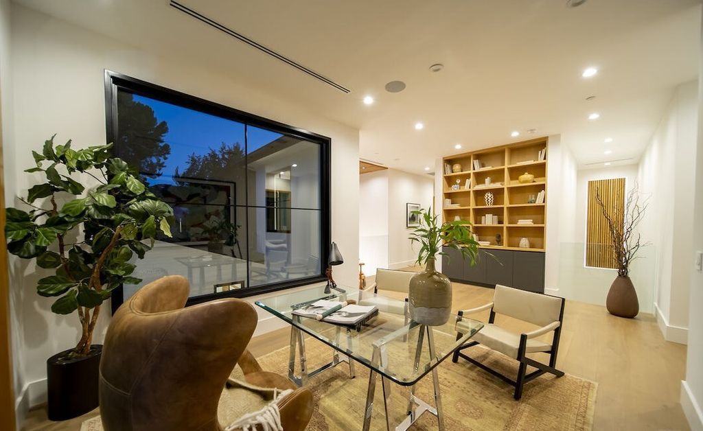 The Home in Encino is a masterfully crafted manor built with tasteful finishes and impeccable attention to detail now available for sale. This home located at 16739 Octavia Pl, Encino, California