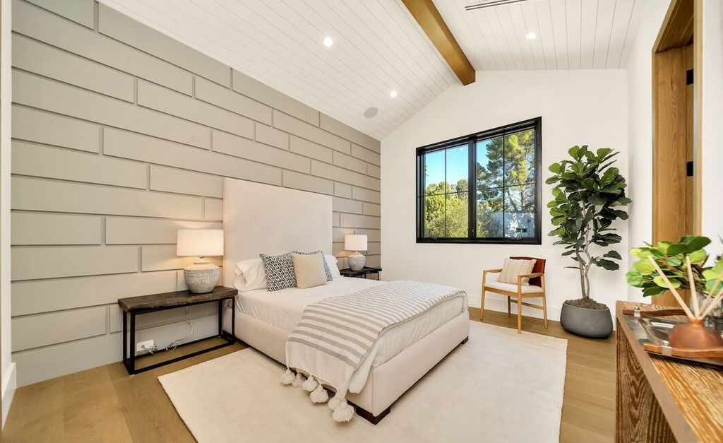 The Home in Encino is a masterfully crafted manor built with tasteful finishes and impeccable attention to detail now available for sale. This home located at 16739 Octavia Pl, Encino, California