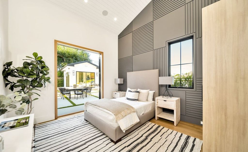 The Home in Encino is a masterfully crafted manor built with tasteful finishes and impeccable attention to detail now available for sale. This home located at 16739 Octavia Pl, Encino, California