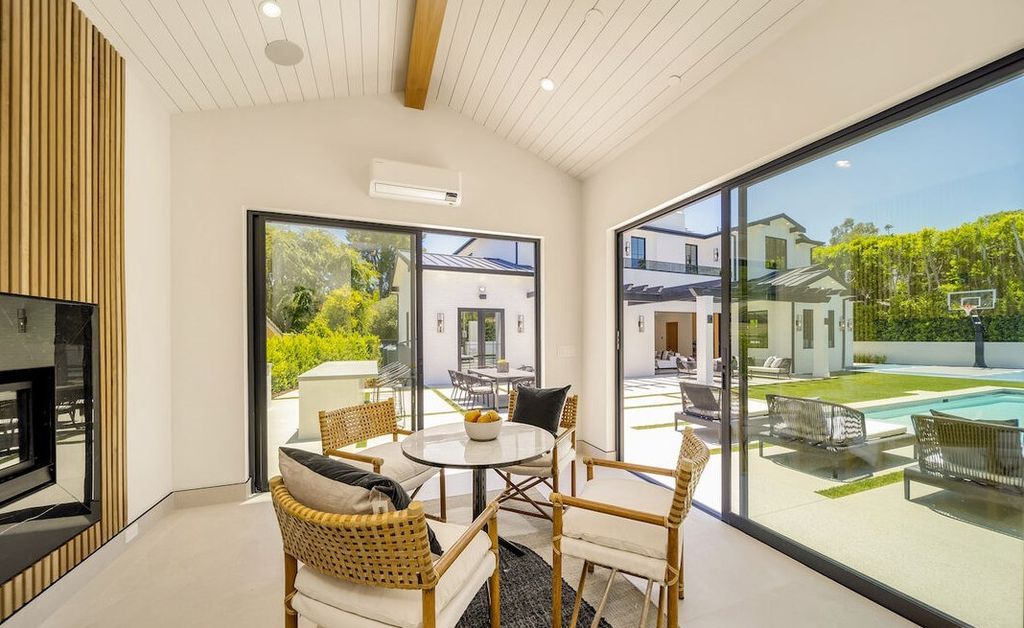 The Home in Encino is a masterfully crafted manor built with tasteful finishes and impeccable attention to detail now available for sale. This home located at 16739 Octavia Pl, Encino, California