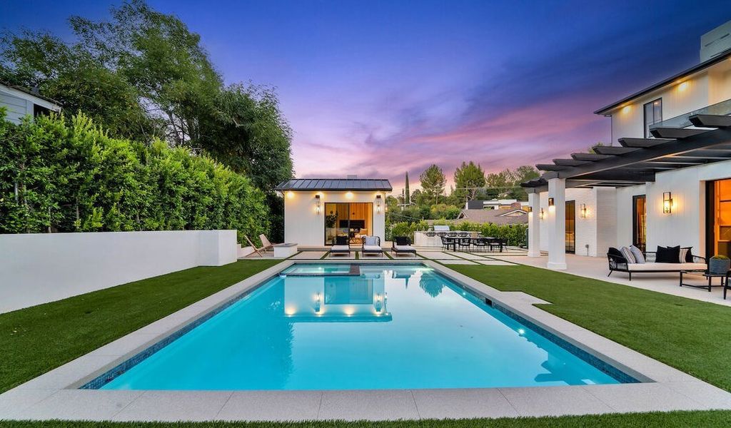 The Home in Encino is a masterfully crafted manor built with tasteful finishes and impeccable attention to detail now available for sale. This home located at 16739 Octavia Pl, Encino, California