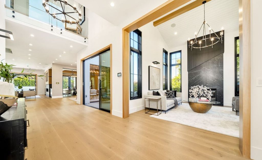 The Home in Encino is a masterfully crafted manor built with tasteful finishes and impeccable attention to detail now available for sale. This home located at 16739 Octavia Pl, Encino, California