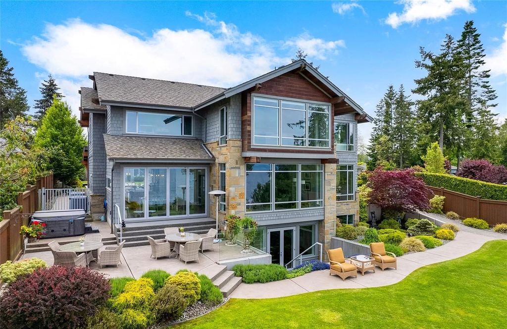 The Home in Parksville is majestically set on 0.64 of an acre with a private path that leads to the beach living space below, now available for sale. This home located at 798 Fairwind Ave, Parksville, BC V9P 1B2, Canada