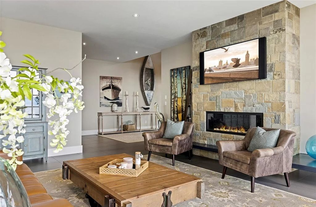The Home in Parksville is majestically set on 0.64 of an acre with a private path that leads to the beach living space below, now available for sale. This home located at 798 Fairwind Ave, Parksville, BC V9P 1B2, Canada