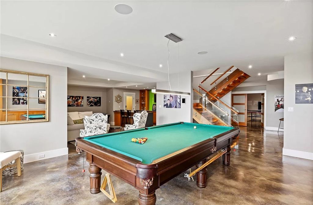 The Home in Parksville is majestically set on 0.64 of an acre with a private path that leads to the beach living space below, now available for sale. This home located at 798 Fairwind Ave, Parksville, BC V9P 1B2, Canada