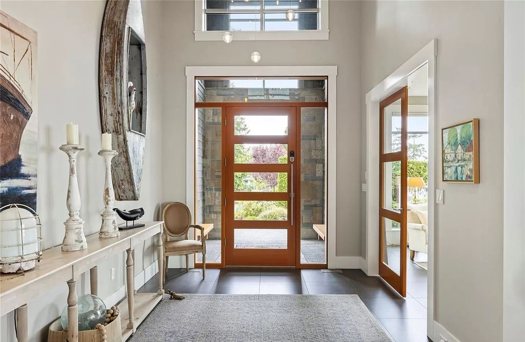 The Home in Parksville is majestically set on 0.64 of an acre with a private path that leads to the beach living space below, now available for sale. This home located at 798 Fairwind Ave, Parksville, BC V9P 1B2, Canada