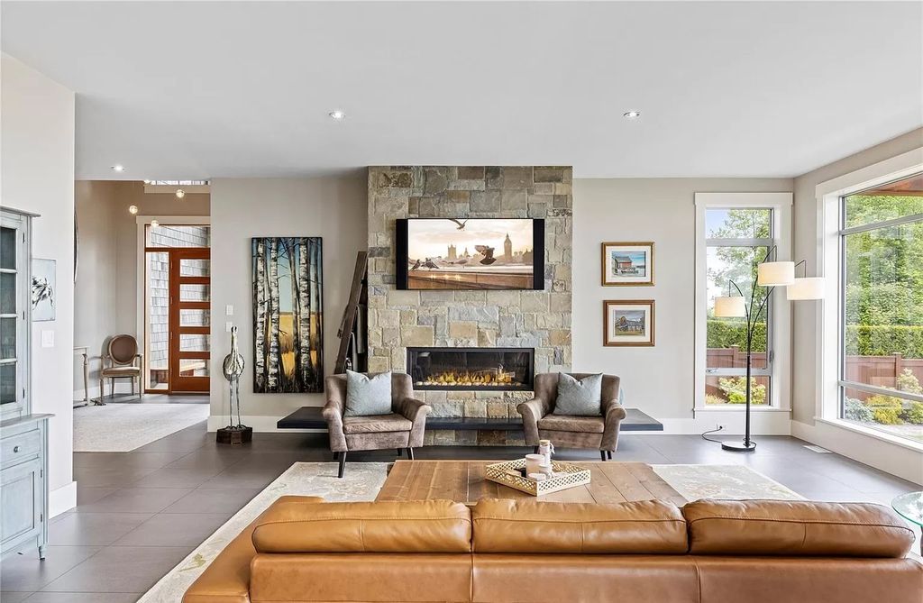 The Home in Parksville is majestically set on 0.64 of an acre with a private path that leads to the beach living space below, now available for sale. This home located at 798 Fairwind Ave, Parksville, BC V9P 1B2, Canada