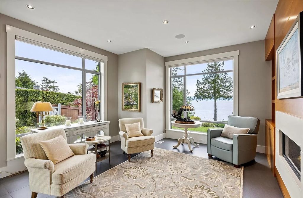 The Home in Parksville is majestically set on 0.64 of an acre with a private path that leads to the beach living space below, now available for sale. This home located at 798 Fairwind Ave, Parksville, BC V9P 1B2, Canada