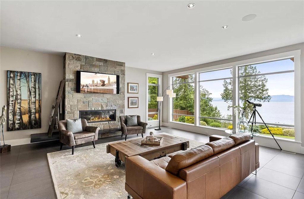 The Home in Parksville is majestically set on 0.64 of an acre with a private path that leads to the beach living space below, now available for sale. This home located at 798 Fairwind Ave, Parksville, BC V9P 1B2, Canada