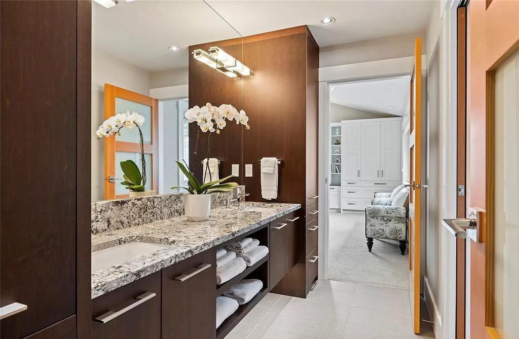 The Home in Parksville is majestically set on 0.64 of an acre with a private path that leads to the beach living space below, now available for sale. This home located at 798 Fairwind Ave, Parksville, BC V9P 1B2, Canada