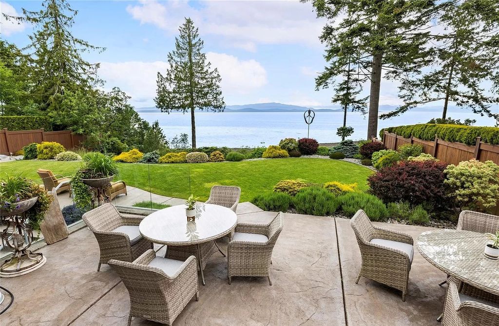 The Home in Parksville is majestically set on 0.64 of an acre with a private path that leads to the beach living space below, now available for sale. This home located at 798 Fairwind Ave, Parksville, BC V9P 1B2, Canada