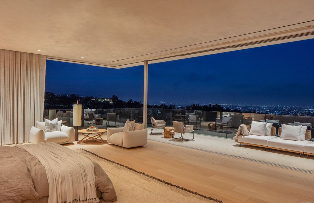 The Los Angeles Mansion is an architectural triumph that redefines luxury living in the world's most prestigious location with the best views in LA now available for sale. This home located at 10721 Stradella Ct, Los Angeles, California