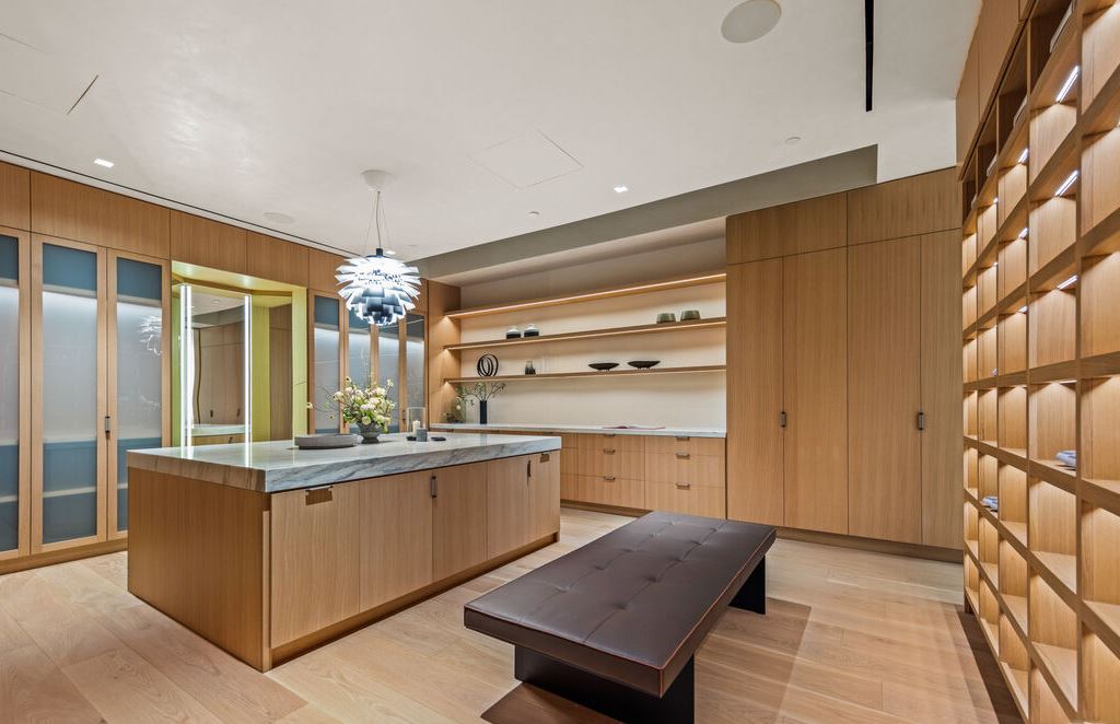 The Los Angeles Mansion is an architectural triumph that redefines luxury living in the world's most prestigious location with the best views in LA now available for sale. This home located at 10721 Stradella Ct, Los Angeles, California