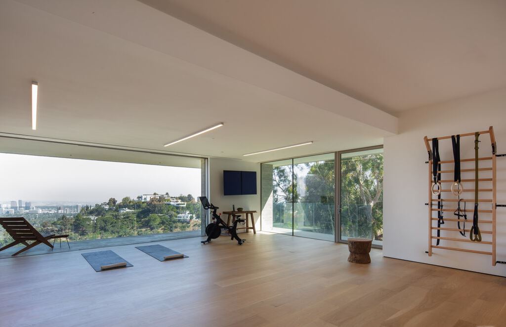 The Los Angeles Mansion is an architectural triumph that redefines luxury living in the world's most prestigious location with the best views in LA now available for sale. This home located at 10721 Stradella Ct, Los Angeles, California