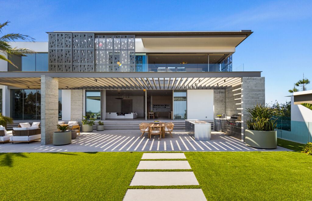 The Los Angeles Mansion is an architectural triumph that redefines luxury living in the world's most prestigious location with the best views in LA now available for sale. This home located at 10721 Stradella Ct, Los Angeles, California