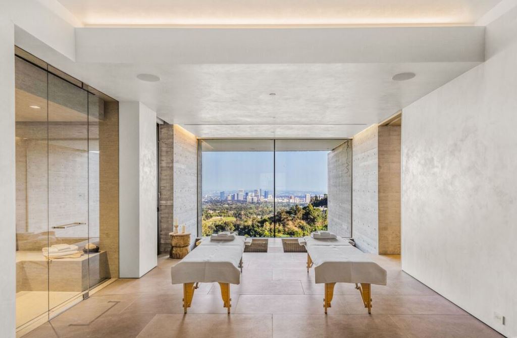 The Los Angeles Mansion is an architectural triumph that redefines luxury living in the world's most prestigious location with the best views in LA now available for sale. This home located at 10721 Stradella Ct, Los Angeles, California