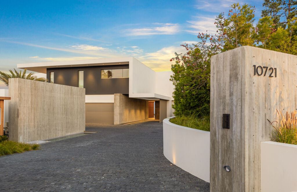 The Los Angeles Mansion is an architectural triumph that redefines luxury living in the world's most prestigious location with the best views in LA now available for sale. This home located at 10721 Stradella Ct, Los Angeles, California