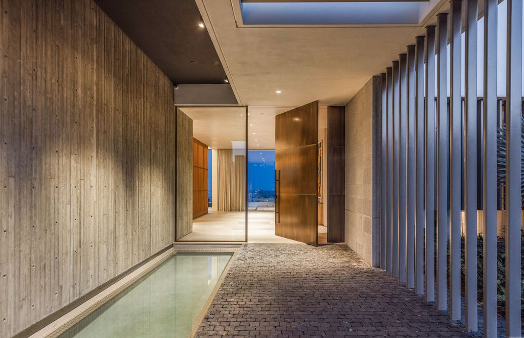The Los Angeles Mansion is an architectural triumph that redefines luxury living in the world's most prestigious location with the best views in LA now available for sale. This home located at 10721 Stradella Ct, Los Angeles, California