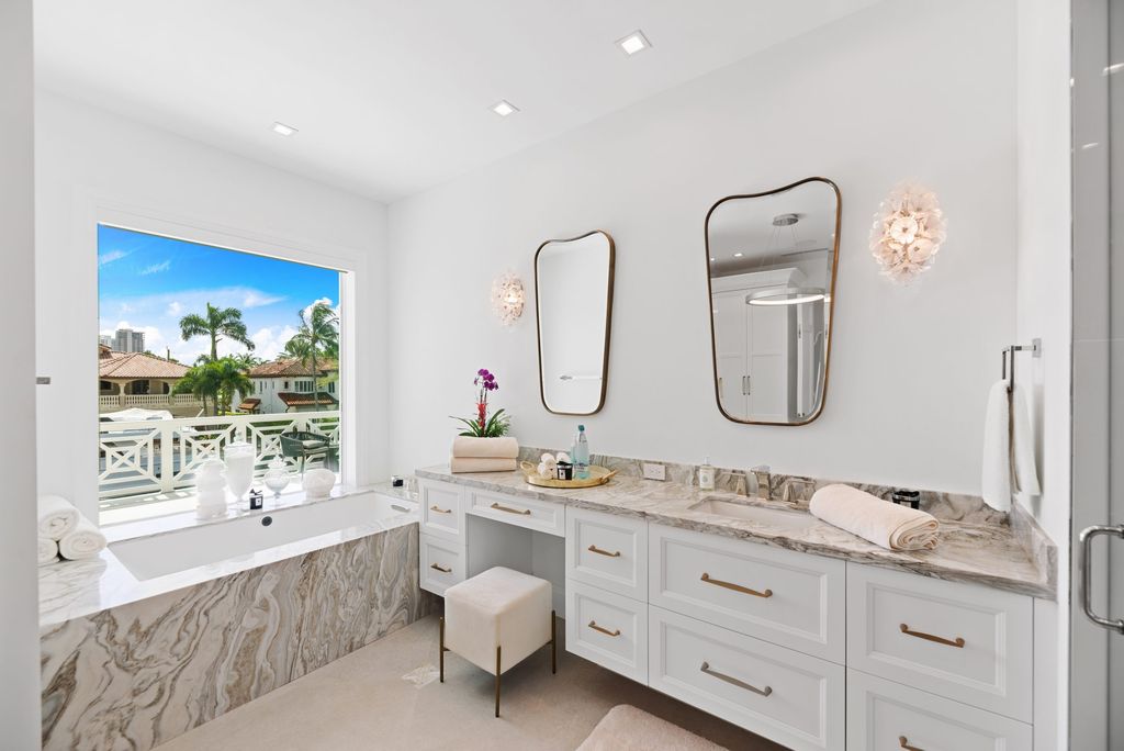 The Masterpiece in Fort Lauderdale, a truly one of a kind magnificent estate with exceptional finishes and craftsmanship featuring the state of the art amenities for entertaining and living. This home located at 52 Royal Palm Dr, Fort Lauderdale, Florida.