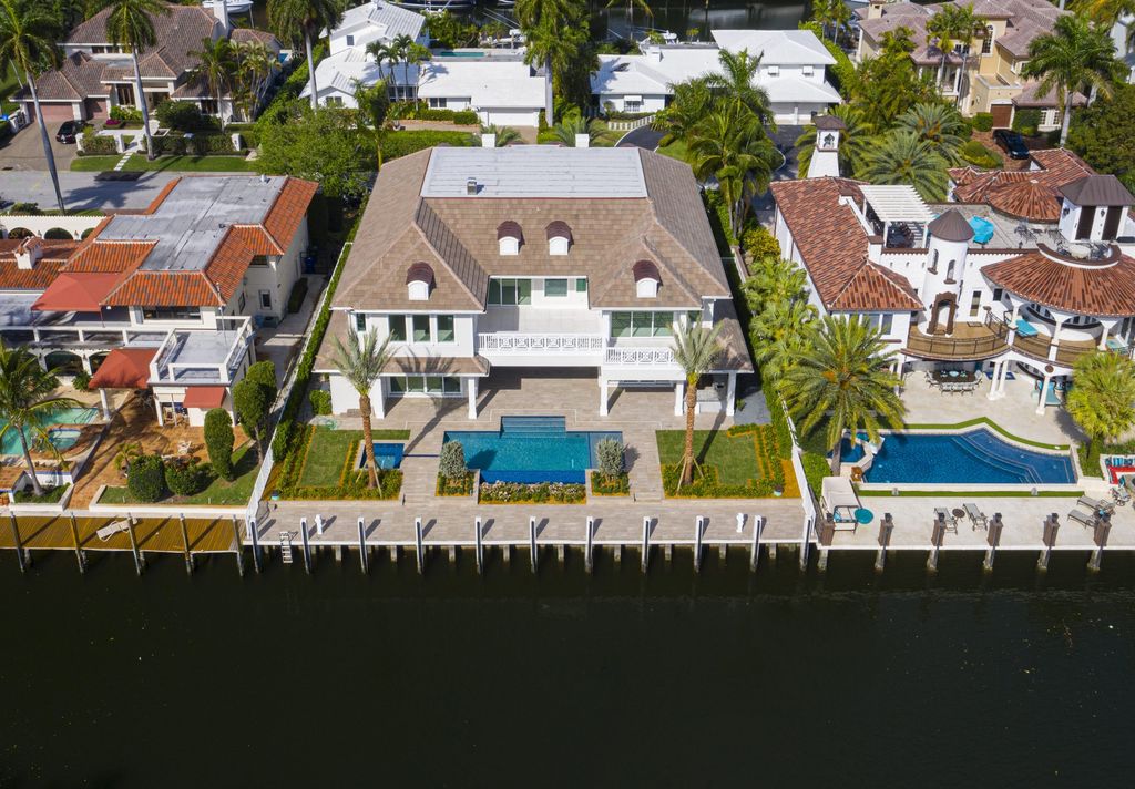 The Masterpiece in Fort Lauderdale, a truly one of a kind magnificent estate with exceptional finishes and craftsmanship featuring the state of the art amenities for entertaining and living. This home located at 52 Royal Palm Dr, Fort Lauderdale, Florida.