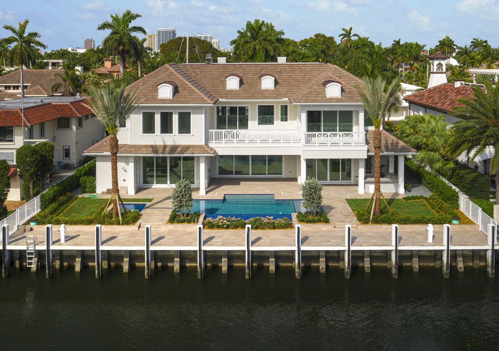 The Masterpiece in Fort Lauderdale, a truly one of a kind magnificent estate with exceptional finishes and craftsmanship featuring the state of the art amenities for entertaining and living. This home located at 52 Royal Palm Dr, Fort Lauderdale, Florida.