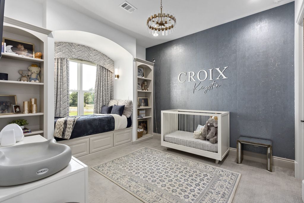 The Home in Bryan, a luxurious custom residence has a open concept great room complete with 20-foot ceilings, a beautifully designed pool and elegant outdoor entertaining area. This home located at 7163 Riverstone Dr, Bryan, Texas.
