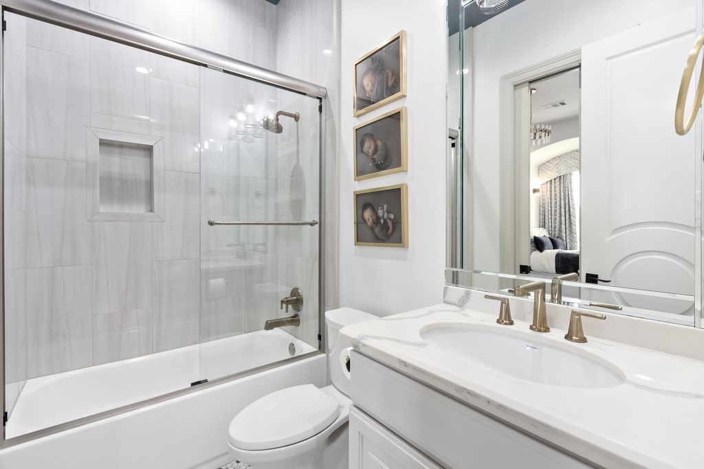 The Home in Bryan, a luxurious custom residence has a open concept great room complete with 20-foot ceilings, a beautifully designed pool and elegant outdoor entertaining area. This home located at 7163 Riverstone Dr, Bryan, Texas.