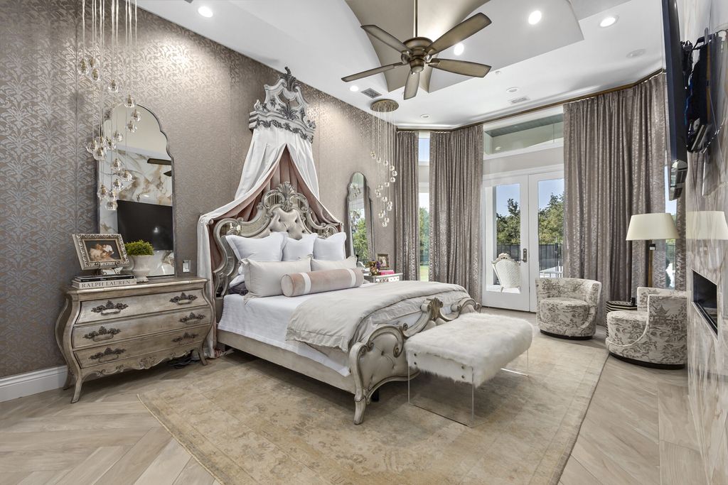 The Home in Bryan, a luxurious custom residence has a open concept great room complete with 20-foot ceilings, a beautifully designed pool and elegant outdoor entertaining area. This home located at 7163 Riverstone Dr, Bryan, Texas.