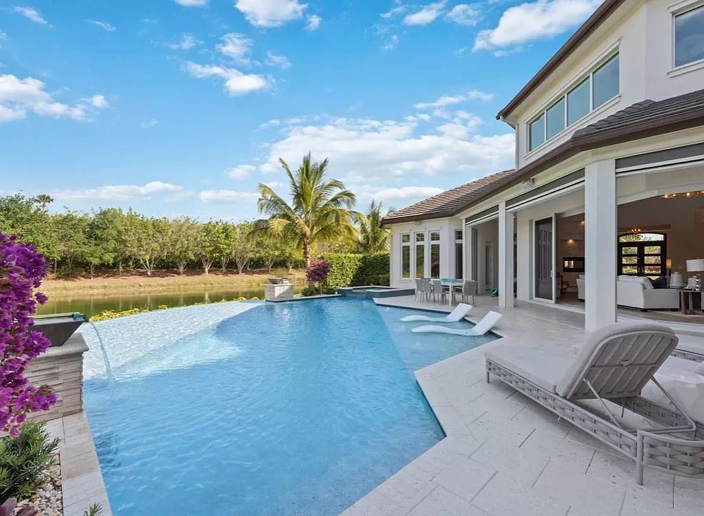 The Home in Miromar Lakes, a magnificent estate on a private waterfront peninsula showcases exquisite architectural details and an amazing outdoor oasis is now available for sale. This home located at 11910 Via Salerno Way, Miromar Lakes, Florida