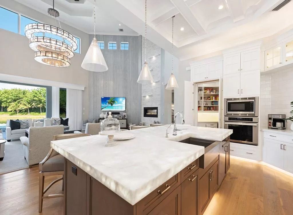 The Home in Miromar Lakes, a magnificent estate on a private waterfront peninsula showcases exquisite architectural details and an amazing outdoor oasis is now available for sale. This home located at 11910 Via Salerno Way, Miromar Lakes, Florida