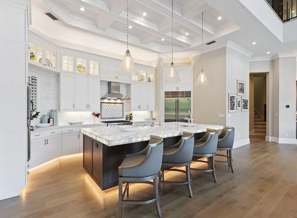 The Home in Miromar Lakes, a magnificent estate on a private waterfront peninsula showcases exquisite architectural details and an amazing outdoor oasis is now available for sale. This home located at 11910 Via Salerno Way, Miromar Lakes, Florida