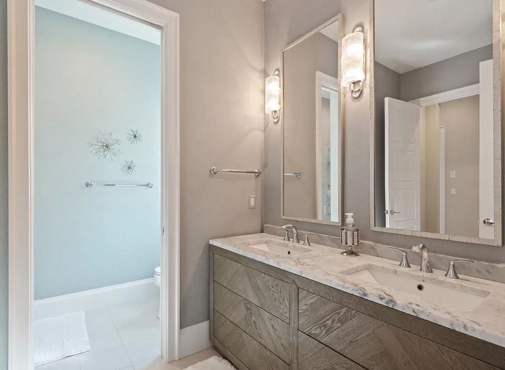 The Home in Miromar Lakes, a magnificent estate on a private waterfront peninsula showcases exquisite architectural details and an amazing outdoor oasis is now available for sale. This home located at 11910 Via Salerno Way, Miromar Lakes, Florida
