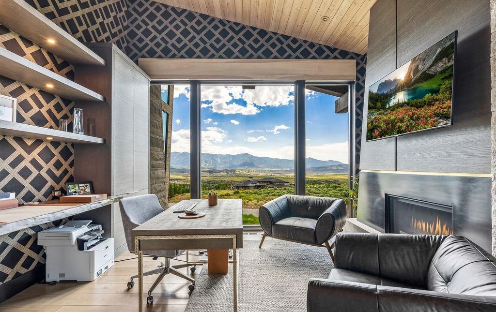 The Masterpiece in Park City, an amazing Upwall Design home showcases the stunning views, the majestic expanse of the main hallway, the seamless marriage of wood, stone and glass. This home located at 7400 Bugle Trl, Park City, Utah.