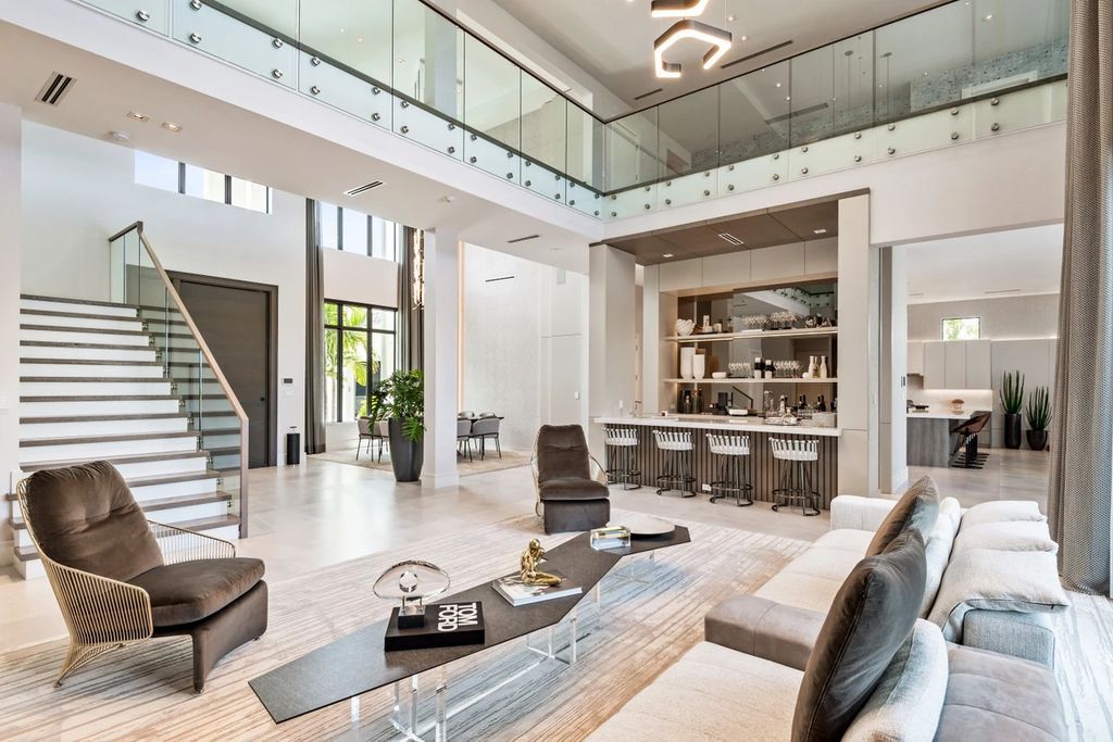 The Home in Boca Raton, the most exceptional home in Royal Palm Polo features luxurious wall coverings, custom built-ins and exquisite lighting is now available for sale. This home located at 7405 NW 27th Ave, Boca Raton, Florida