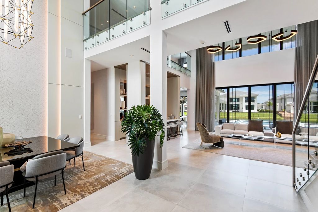 The Home in Boca Raton, the most exceptional home in Royal Palm Polo features luxurious wall coverings, custom built-ins and exquisite lighting is now available for sale. This home located at 7405 NW 27th Ave, Boca Raton, Florida