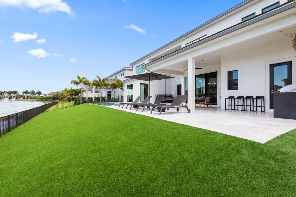 The Home in Boca Raton, the most exceptional home in Royal Palm Polo features luxurious wall coverings, custom built-ins and exquisite lighting is now available for sale. This home located at 7405 NW 27th Ave, Boca Raton, Florida