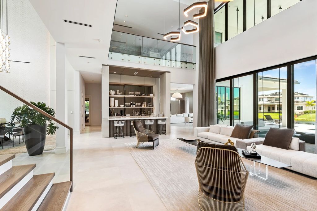 The Home in Boca Raton, the most exceptional home in Royal Palm Polo features luxurious wall coverings, custom built-ins and exquisite lighting is now available for sale. This home located at 7405 NW 27th Ave, Boca Raton, Florida