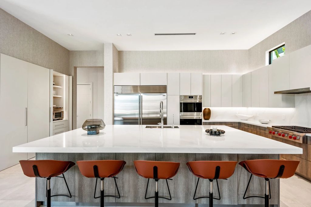 The Home in Boca Raton, the most exceptional home in Royal Palm Polo features luxurious wall coverings, custom built-ins and exquisite lighting is now available for sale. This home located at 7405 NW 27th Ave, Boca Raton, Florida