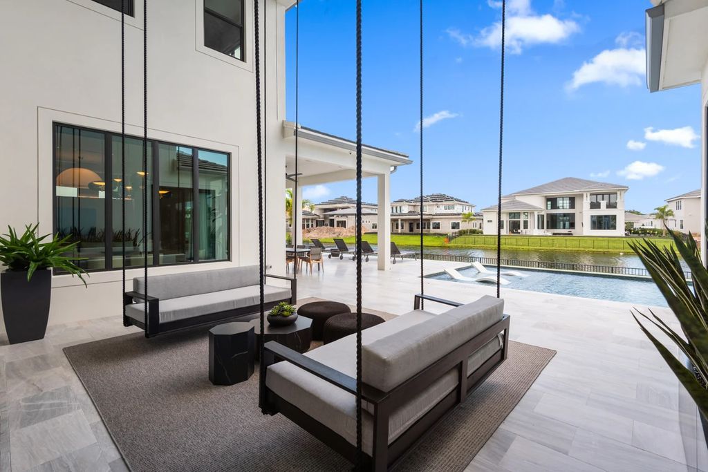 The Home in Boca Raton, the most exceptional home in Royal Palm Polo features luxurious wall coverings, custom built-ins and exquisite lighting is now available for sale. This home located at 7405 NW 27th Ave, Boca Raton, Florida