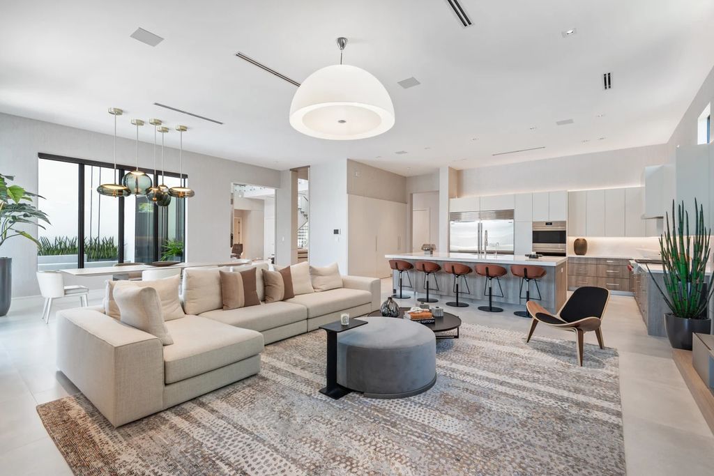The Home in Boca Raton, the most exceptional home in Royal Palm Polo features luxurious wall coverings, custom built-ins and exquisite lighting is now available for sale. This home located at 7405 NW 27th Ave, Boca Raton, Florida