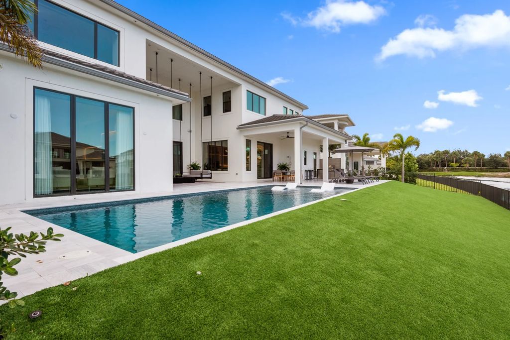 The Home in Boca Raton, the most exceptional home in Royal Palm Polo features luxurious wall coverings, custom built-ins and exquisite lighting is now available for sale. This home located at 7405 NW 27th Ave, Boca Raton, Florida