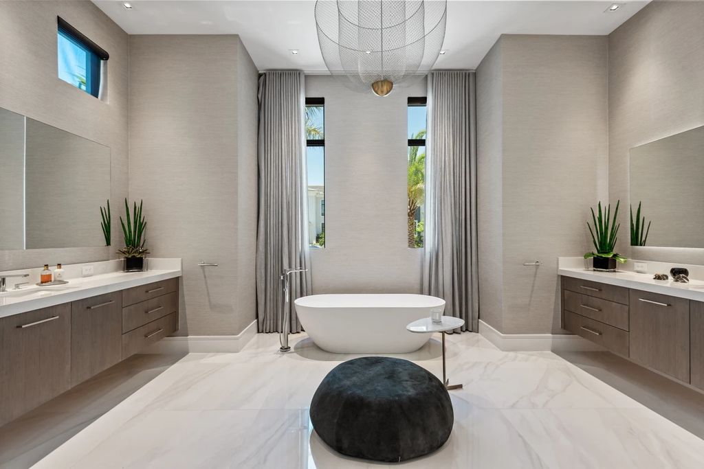 The Home in Boca Raton, the most exceptional home in Royal Palm Polo features luxurious wall coverings, custom built-ins and exquisite lighting is now available for sale. This home located at 7405 NW 27th Ave, Boca Raton, Florida