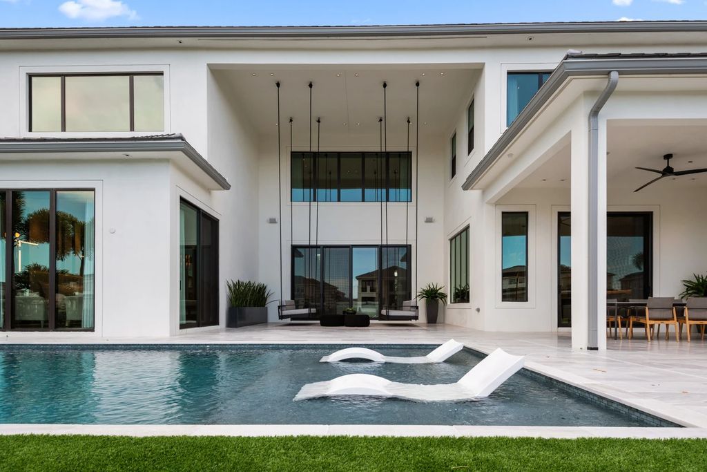 The Home in Boca Raton, the most exceptional home in Royal Palm Polo features luxurious wall coverings, custom built-ins and exquisite lighting is now available for sale. This home located at 7405 NW 27th Ave, Boca Raton, Florida