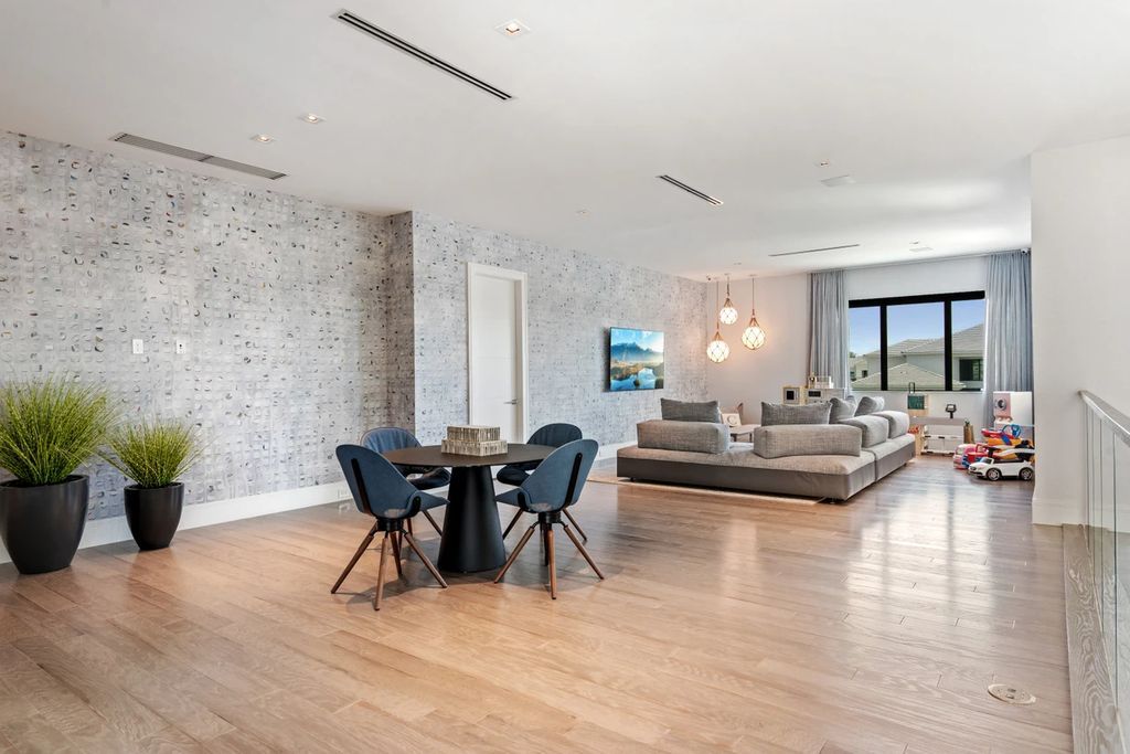 The Home in Boca Raton, the most exceptional home in Royal Palm Polo features luxurious wall coverings, custom built-ins and exquisite lighting is now available for sale. This home located at 7405 NW 27th Ave, Boca Raton, Florida