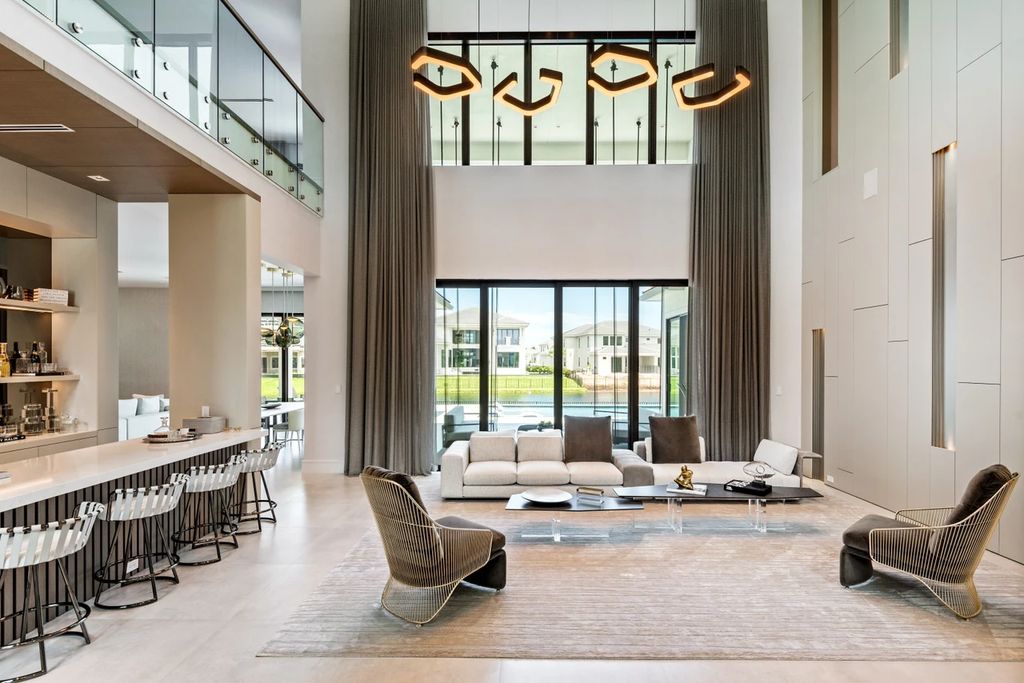 The Home in Boca Raton, the most exceptional home in Royal Palm Polo features luxurious wall coverings, custom built-ins and exquisite lighting is now available for sale. This home located at 7405 NW 27th Ave, Boca Raton, Florida