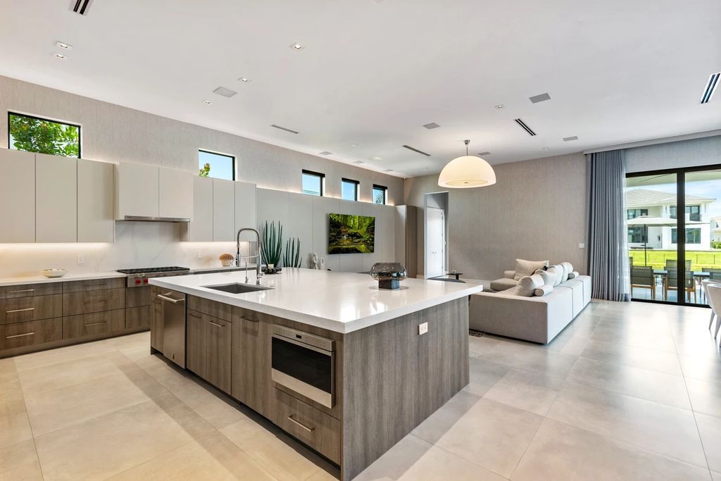 The Home in Boca Raton, the most exceptional home in Royal Palm Polo features luxurious wall coverings, custom built-ins and exquisite lighting is now available for sale. This home located at 7405 NW 27th Ave, Boca Raton, Florida