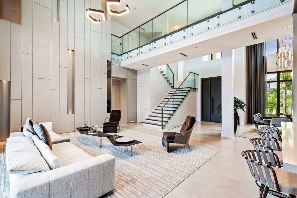 The Home in Boca Raton, the most exceptional home in Royal Palm Polo features luxurious wall coverings, custom built-ins and exquisite lighting is now available for sale. This home located at 7405 NW 27th Ave, Boca Raton, Florida