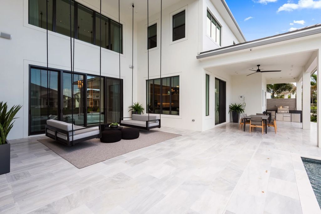 The Home in Boca Raton, the most exceptional home in Royal Palm Polo features luxurious wall coverings, custom built-ins and exquisite lighting is now available for sale. This home located at 7405 NW 27th Ave, Boca Raton, Florida