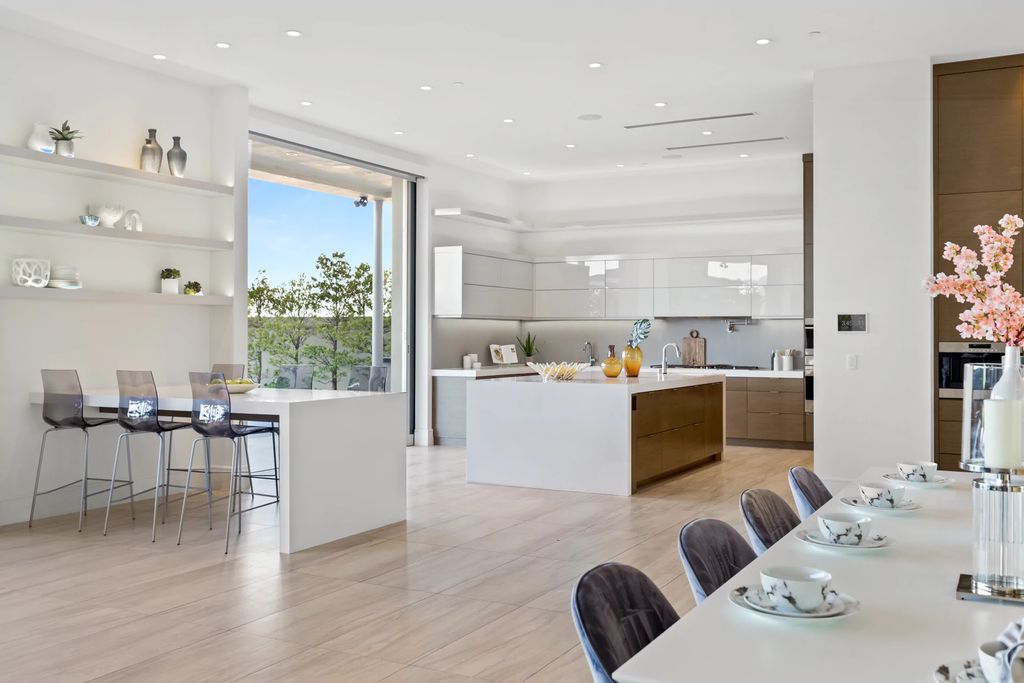 The Masterpiece in Las Vegas, a stunning contemporary home majestically perched within the prestigious guard-gated Spanish Hills offering some of the best Las Vegas Strip views. This home located at 5198 Scenic Ridge Dr, Las Vegas, Nevada.