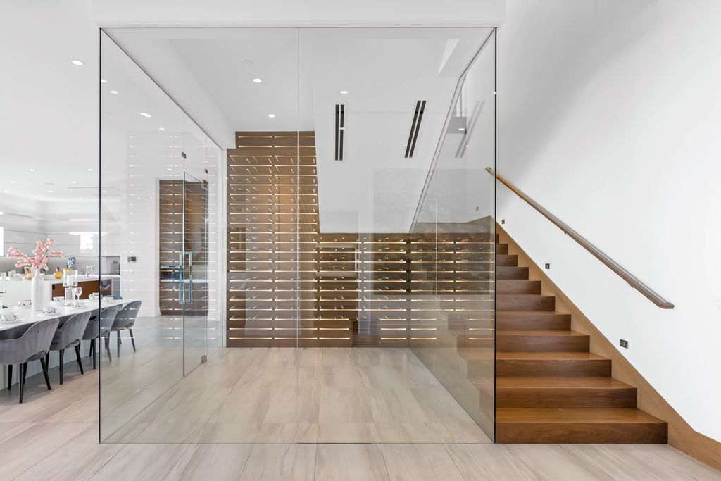 The Masterpiece in Las Vegas, a stunning contemporary home majestically perched within the prestigious guard-gated Spanish Hills offering some of the best Las Vegas Strip views. This home located at 5198 Scenic Ridge Dr, Las Vegas, Nevada.
